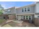 Townhome backyard with patio, fencing, and mature landscaping at 1025 Cherryfield Run, Marietta, GA 30008