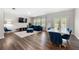Open concept living area featuring hardwood floors and bright natural light at 1025 Cherryfield Run, Marietta, GA 30008