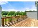 Back porch features wooden surface with fenced surroundings at 1172 Edwin Ln, Sugar Hill, GA 30518