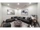Living room with sofa set, table and two paintings at 1172 Edwin Ln, Sugar Hill, GA 30518