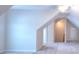 Spacious bonus room with neutral carpeting and a ceiling fan, perfect for relaxation or recreation at 2010 Hickory Station Cir, Snellville, GA 30078