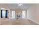 Bright living room with a fireplace and neutral carpet at 2010 Hickory Station Cir, Snellville, GA 30078