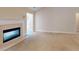 Bright living room featuring fireplace and neutral carpet at 2010 Hickory Station Cir, Snellville, GA 30078
