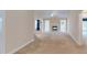 Open concept living room with a fireplace and multiple openings to other rooms in the house at 2010 Hickory Station Cir, Snellville, GA 30078
