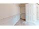 Walk-in closet with built-in shelving for ample storage at 2010 Hickory Station Cir, Snellville, GA 30078