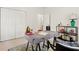 Well-lit home office with a modern desk setup, decorative accents, and practical storage, ideal for productivity at 2089 College Ne Ave, Atlanta, GA 30317
