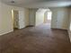 Large bonus room providing lots of open space and natural light from multiple windows at 3827 Micah Ln, Ellenwood, GA 30294