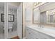 Bathroom boasts a white vanity, decorative wallpaper, and a separate toilet and shower room at 3231 Connemara Trce, Lawrenceville, GA 30044