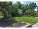 Charming two-story home with a well-manicured lawn and lush landscaping at 3231 Connemara Trce, Lawrenceville, GA 30044