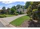 Charming two-story home with a long driveway, well-manicured lawn and lush landscaping at 3231 Connemara Trce, Lawrenceville, GA 30044