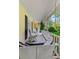 Relaxing front porch with a swing, comfortable seating, and views of the lush greenery at 3231 Connemara Trce, Lawrenceville, GA 30044