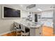 Stylish kitchen with marble countertops, a center island, and white cabinetry at 3231 Connemara Trce, Lawrenceville, GA 30044