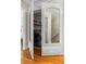 A custom door opens to reveal a laundry area complete with washer and dryer hookups at 3231 Connemara Trce, Lawrenceville, GA 30044