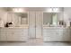 Bathroom with and vanities featuring white cabinets at 3894 Land O Lakes Ne Dr, Atlanta, GA 30342
