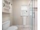 Modern bathroom features a white toilet, open shelving and a glass-enclosed shower at 3894 Land O Lakes Ne Dr, Atlanta, GA 30342