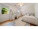 Bedroom with blue accents, vanity, and white trim at 3894 Land O Lakes Ne Dr, Atlanta, GA 30342