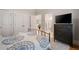 Bedroom with neutral colors, window with blinds, and furniture at 3894 Land O Lakes Ne Dr, Atlanta, GA 30342