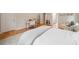 Bright bedroom with hardwood floors, a writing desk, and a comfortable seating area at 3894 Land O Lakes Ne Dr, Atlanta, GA 30342