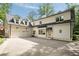Home with a two-car garage and a basketball hoop at 3894 Land O Lakes Ne Dr, Atlanta, GA 30342
