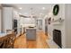 Spacious kitchen with stainless steel appliances, white cabinets, and a center island at 3894 Land O Lakes Ne Dr, Atlanta, GA 30342