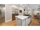 Spacious kitchen with stainless steel appliances, center island, and dining area nearby at 3894 Land O Lakes Ne Dr, Atlanta, GA 30342