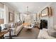 Bright living room with fireplace, neutral colors, and open floor plan at 3894 Land O Lakes Ne Dr, Atlanta, GA 30342
