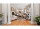 Elegant living room with fireplace, hardwood floors, and neutral decor at 3894 Land O Lakes Ne Dr, Atlanta, GA 30342