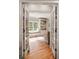 Cozy office space with built-in shelving and a window seat at 3894 Land O Lakes Ne Dr, Atlanta, GA 30342