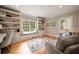 Serene office with built-in shelving, window seat, and comfortable seating at 3894 Land O Lakes Ne Dr, Atlanta, GA 30342