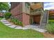 Backyard with lush grass and a back patio and deck at 7047 Bennington Ln, Cumming, GA 30041