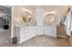 Beautiful bathroom boasts double sinks, vanity, and tile flooring at 7047 Bennington Ln, Cumming, GA 30041