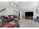 Expansive living room with ample seating, soaring ceilings, and stylish decor offers a great space at 7047 Bennington Ln, Cumming, GA 30041