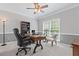 Bright home office with hardwood floors, crown molding and large windows at 7047 Bennington Ln, Cumming, GA 30041