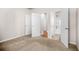 Cozy carpeted bedroom with multiple doors, providing easy access to other areas of the house at 18 Dorothy Ln, Lawrenceville, GA 30046