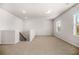Spacious bonus room with plush carpet, neutral walls and large windows for plenty of natural light at 18 Dorothy Ln, Lawrenceville, GA 30046