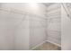 Walk-in closet with wire shelving offers plenty of room for organizing clothes and accessories at 18 Dorothy Ln, Lawrenceville, GA 30046