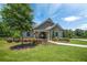 Charming community clubhouse with well-manicured landscaping and a sidewalk leading to the entrance at 18 Dorothy Ln, Lawrenceville, GA 30046