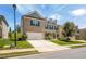 Beautiful two-story home showcasing a brick facade, attached two-car garage, and green lawn at 18 Dorothy Ln, Lawrenceville, GA 30046
