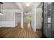 Elegant foyer featuring hardwood floors, wainscoting, and an open floor plan to the living spaces at 18 Dorothy Ln, Lawrenceville, GA 30046