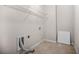 Laundry room with tile flooring and a dryer vent provides a functional space for laundry tasks at 18 Dorothy Ln, Lawrenceville, GA 30046