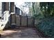 Outdoor back deck overlooking a lush yard offers great space to unwind at 272 Toweridge Dr, Marietta, GA 30064