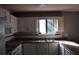 Well-lit kitchen featuring white cabinets, modern appliances, and ample counter space at 272 Toweridge Dr, Marietta, GA 30064