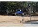 A park area with a blue-roofed gazebo and picnic table nestled among mature trees for outdoor relaxation at 272 Toweridge Dr, Marietta, GA 30064