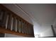Carpeted stairs with wooden railing lead to the upper level of the home at 272 Toweridge Dr, Marietta, GA 30064