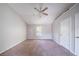 Bedroom with vaulted ceiling and a ceiling fan for added comfort at 3283 Sugar Creek Falls Se Ave, Atlanta, GA 30316