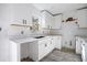 Bright kitchen featuring white cabinets, modern fixtures, and stylish countertop ready for appliances at 3845 Springleaf Ct, Stone Mountain, GA 30083