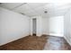 Empty room with old flooring and exposed walls at 3845 Springleaf Ct, Stone Mountain, GA 30083