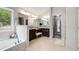 Bright bathroom boasting a soaking tub, dual vanity, and tile flooring at 4371 Wigley Preserve Dr, Marietta, GA 30066