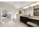 Well-lit bathroom featuring a soaking tub, granite counters, and separate shower at 4371 Wigley Preserve Dr, Marietta, GA 30066