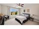 Inviting bedroom with a large window, ceiling fan, and neutral decor at 4371 Wigley Preserve Dr, Marietta, GA 30066